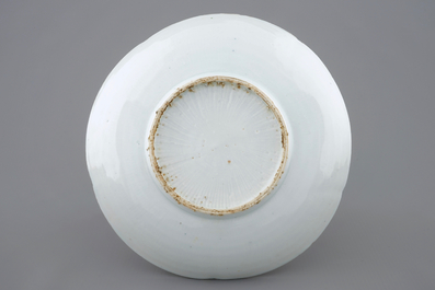 A Chinese wucai plate with twin fish design, Wanli, 1573-1619