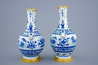 A pair of  Chinese blue and white gilt-bronze mounted jugs, Transitional period, 1620-1683