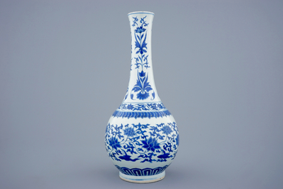 A blue and white Chinese lotus scroll bottle vase, Transitional period, 1620-1683
