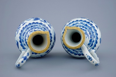 A pair of  Chinese blue and white gilt-bronze mounted jugs, Transitional period, 1620-1683