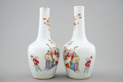 A pair of Chinese famille rose bottle vases, 19th C.