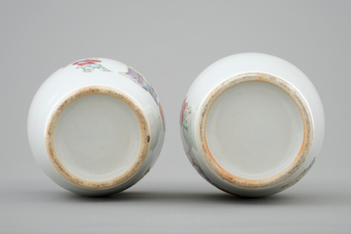 A pair of Chinese famille rose bottle vases, 19th C.
