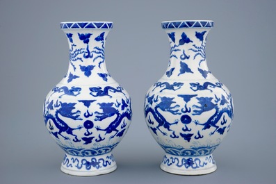 A pair of blue and white dragon vases with Wanli mark, 19th C.