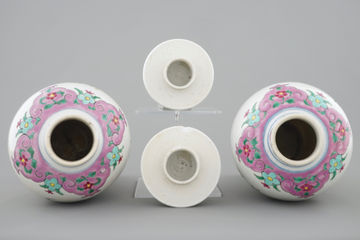 A pair of Chinese famille rose rooster vases and covers, 18/19th C.