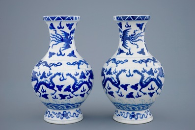 A pair of blue and white dragon vases with Wanli mark, 19th C.