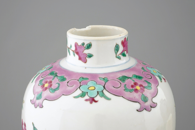 A pair of Chinese famille rose rooster vases and covers, 18/19th C.