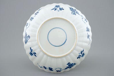 A lobed Chinese famille verte plate with shells among waves, Kangxi