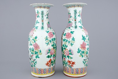 A fine pair of tall Chinese famille rose vases with birds, grapes and flowers, 19th C.