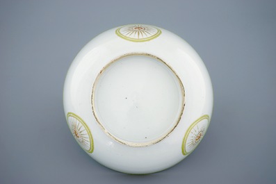 A Chinese export porcelain bowl in tones of green, yellow and purple, Qianlong, 18th C.