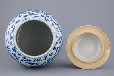 A large Chinese blue and white vase and cover with dragons, 19th C.
