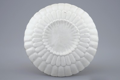 A Chinese famille rose lotus-shaped cup and saucer, Yongzheng, 1723-1735
