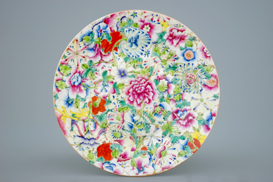 Two Chinese bowls with floral designs and a millefleur plate, 19th C.