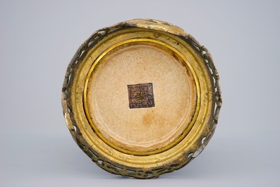 A Chinese Nanking famille rose crackle vase on bronze foot, 19th C.