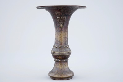 A marked Chinese bronze gu vase with traces of gilt lacquer, late Ming Dynasty