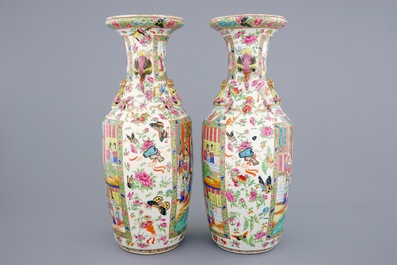 An excellent pair of Chinese Canton famille rose vases with duck handles, 19th C.