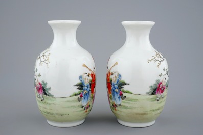 A pair of Chinese famille rose vases with playing boys, 20th C.