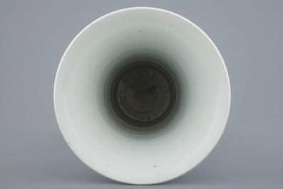 A Chinese blue and white lotus scroll gu beaker vase, Kangxi