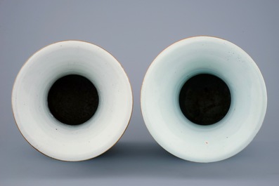 A pair of Chinese famille rose vases with ladies in a garden, 19/20th C.