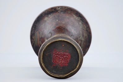 A marked Chinese bronze gu vase with traces of gilt lacquer, late Ming Dynasty