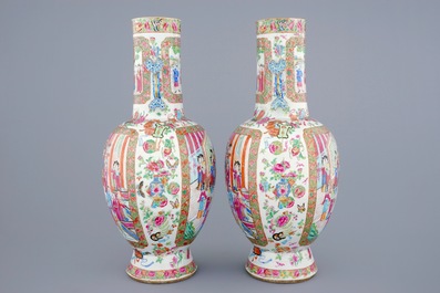 A pair of Chinese Canton famille rose vases with ruyi scepter handles, 19th C.