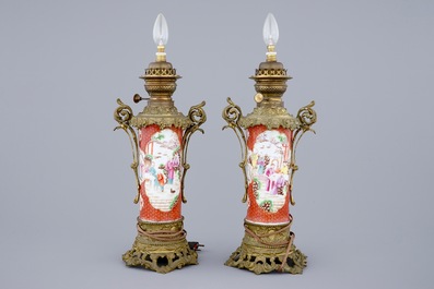 A pair of Chinese mandarin vases with bronze lamp mounts, 18/19th C.
