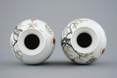 A pair of Chinese famille rose vases with playing boys, 20th C.