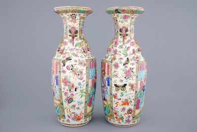 An excellent pair of Chinese Canton famille rose vases with duck handles, 19th C.
