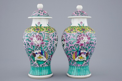A pair of Chinese famille rose vases and covers, 19/20th C.