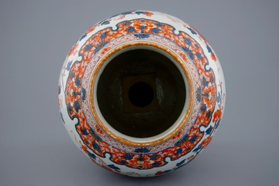 A large Chinese Imari-style export porcelain vase on gilt bronze foot, 18th C.