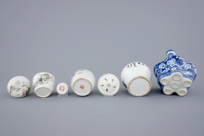 A Chinese blue and white tulip vase and 3 small famille rose covered jars, 19th C.