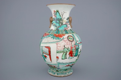 A large Chinese famille verte vase with a continuous scene and elephant handles, 19th C.