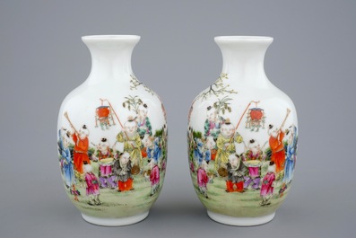 A pair of Chinese famille rose vases with playing boys, 20th C.