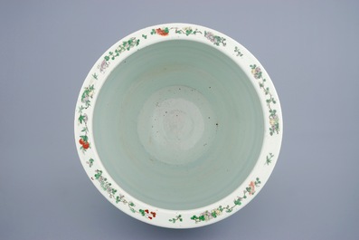 A Chinese famille verte fish bowl with figures, 19th C.