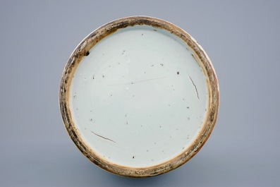 A Chinese blue and white on celadon ground porcelain vase with foo dogs, 19th C.