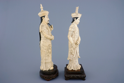 A tall pair of Chinese carved ivory emperor figures, ca. 1900