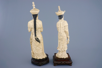 A tall pair of Chinese carved ivory emperor figures, ca. 1900