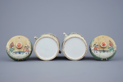 A pair of Chinese famille verte Kangxi style covered bowls, 19th C.