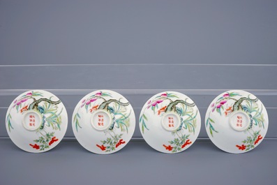 Een set van 9 Chinese famille rose kommetjes met perzikendecor, Guangxu merk en periode