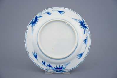 A set of 6 Chinese blue and white saucers with horseriders, Kangxi