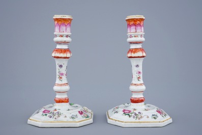A pair of Chinese famille rose candlesticks, Qianlong, 18th C.
