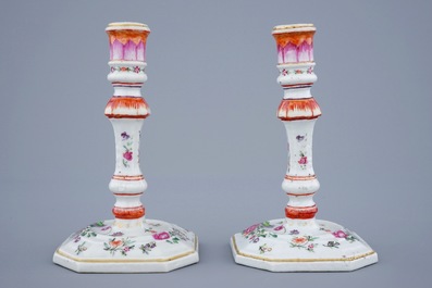 A pair of Chinese famille rose candlesticks, Qianlong, 18th C.