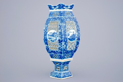 A Chinese blue and white pierced lantern on stand, 19th C.