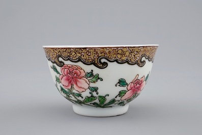 A Chinese famille rose eggshell cup and saucer with butterflies among flowers, Yongzheng, 1723-1735