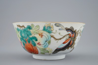 A Chinese famille rose vase with applied flowers and a bowl, 19th C.