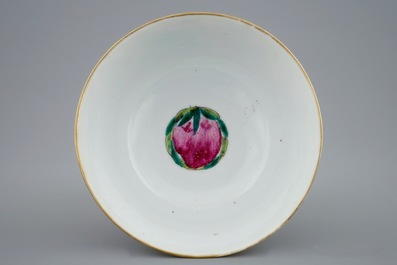 A Chinese famille rose vase with applied flowers and a bowl, 19th C.