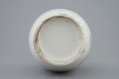 A Chinese famille rose vase with applied flowers and a bowl, 19th C.