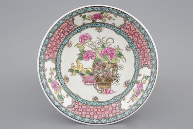 A Chinese famille rose eggshell cup and saucer with a cat near a flowervase, Yongzheng, 1723-1735