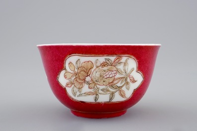 A Chinese eggshell ruby ground cup and saucer, Yongzheng, 1723-1735