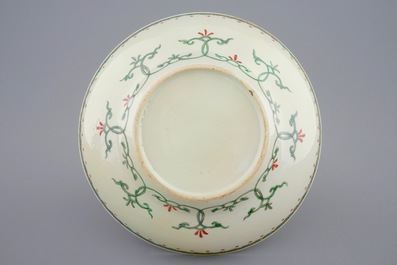 A Chinese famille verte teapot and a plate with fish, Kangxi