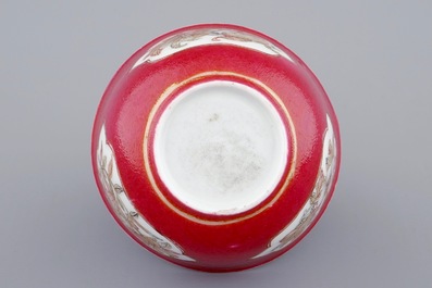 A Chinese eggshell ruby ground cup and saucer, Yongzheng, 1723-1735